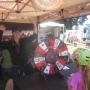 Alyse Weyman spins the Giant Wheel of goodies at the Bicycle Trip tent.