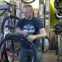 Nate Trumble spins the wheel of misfortune in the 'fix a flat' part of the pre-ride workshop at Bicycle Trip. HT photo.