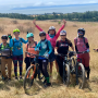 Happy bikers on a Girls Rock Monthly Ride. Photo © Mary Pat Davey