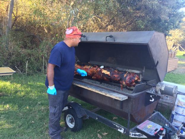 The chef's cousin and assistant arrived at the beach at 9am to start grilling the humanely raised pork from Fogline Farms.  
