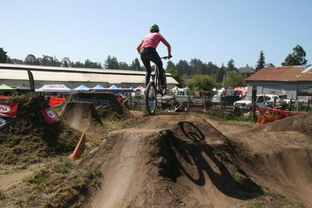 Having made her name in the competitive dirt jumping world, Lisa (Myklak) Tharp demonstrated top form at the Sugar Showdown in 2013 at the Santa Cruz Mountain Bike Festival. She will return to the festival this year as a dirt jumping coach with Kat Sweet of Sweetlines.  Having made her name in the competitive dirt jumping world, Lisa (Myklak) Tharp demonstrated top form at the Sugar Showdown in 2013 at the Santa Cruz Mountain Bike Festival. She will return to the festival this year as a dirt jumping coach with Kat Sweet of Sweetlines.