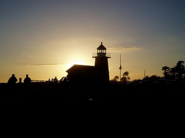 The Lighthouse soaks in it's last rays of the day. Photo by Jun on Flickr. 