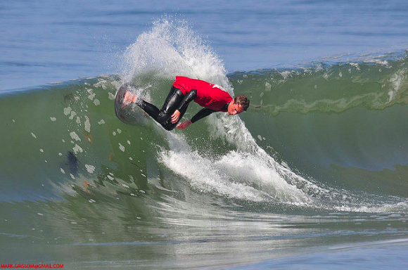 Skimboarder on 26th Avenue surf break in Santa Cruz. Photo credit: Mark Grissom.