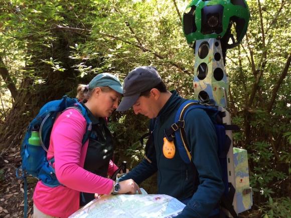Amanda Krauss and Paul Davis study a Big Basin map before hitting the trail with Trekker. Hilltromper photo.