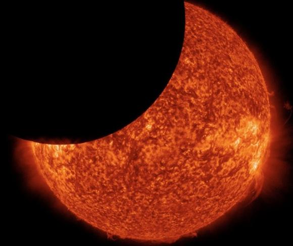 Partial solar eclipse on Jan. 30, 2014 as seen from space. NASA image.