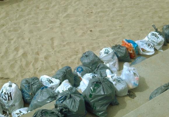 Trash bags collected from Main Beach on July 5. Hilltromper photo.
