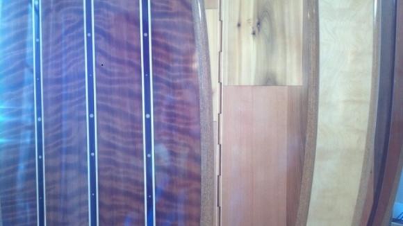 Closeup of three Ventana Surf Co wood surfboards at Stripe MEN. Hilltromper photo. 